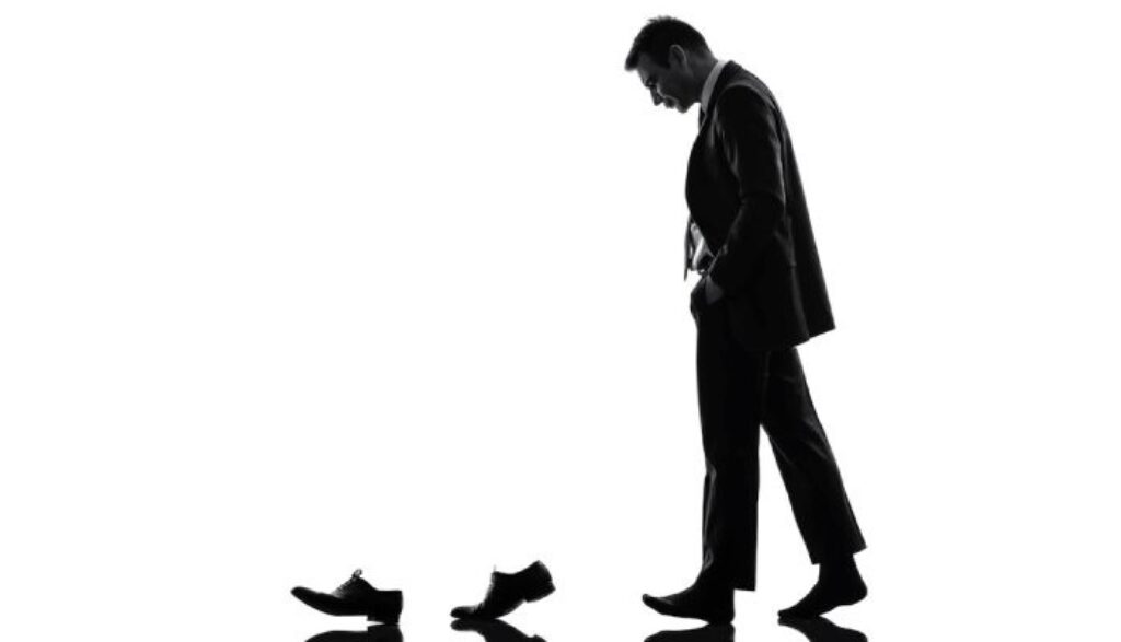 A man walking and a pair of shoes- best practice to do Etsy SEO